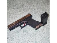 Страйкбольный пистолет WE GLOCK-17 с внешним тюнингом.