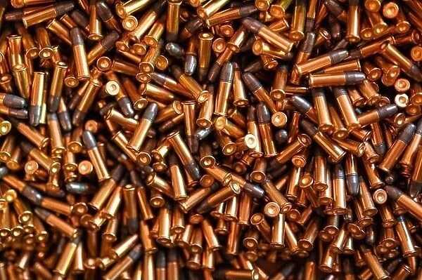 heap-black-golden-small-caliber-bullets-table-3470